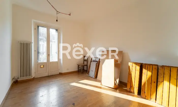 Rexer-Milano-Ultimo-piano-bilocale-facilmente-trasformabile-Camera-da-letto