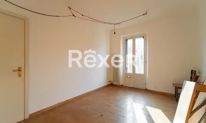 Rexer-Milano-Ultimo-piano-bilocale-facilmente-trasformabile-Camera-da-letto