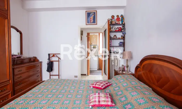 Rexer-Milano-Appartamento-due-locali-di-mq-Camera-da-letto-matrimoniale