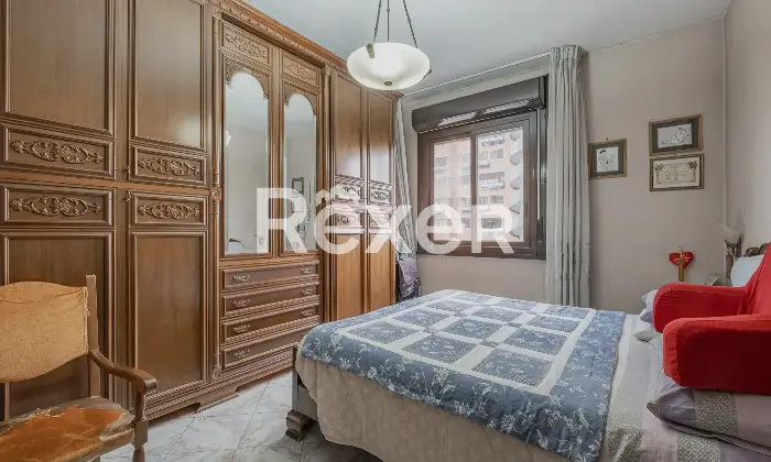 Rexer-Roma-Grazioso-Trilocale-con-terrazzo-panoramico-Camera-da-letto-matrimoniale