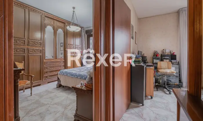 Rexer-Roma-Grazioso-Trilocale-con-terrazzo-panoramico-Camera-da-letto