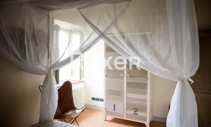 Rexer-Monteriggioni-appartamento-arredato-in-ex-convento-nel-cuore-della-toscana-CameraDaLetto