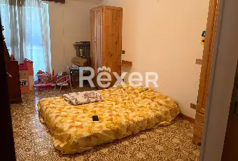 Rexer-Tagliacozzo-Spazioso-appartamento-CameraDaLetto