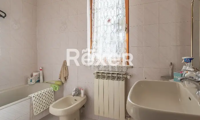 Rexer-Roma-Villetta-a-schiera-con-garage-e-posto-auto-Altro