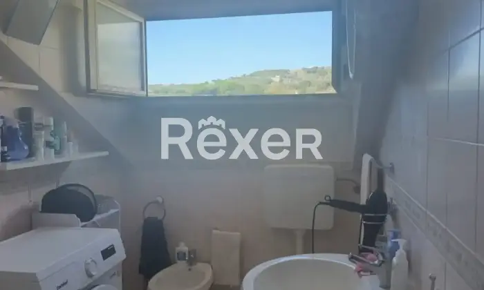 Rexer-Falerna-Mansarda-con-splendida-vista-mare-Bagno