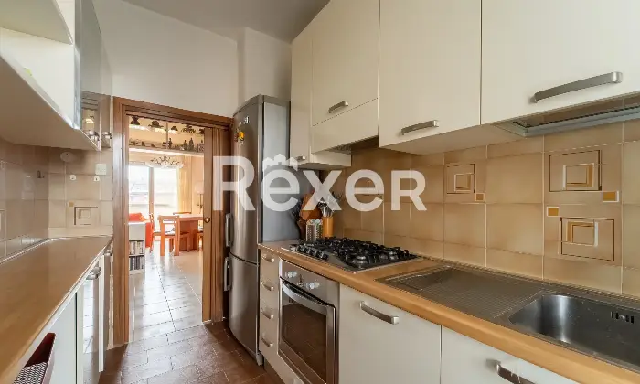 Rexer-Milano-Tre-locali-al-piano-alto-Altro