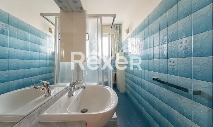 Rexer-Milano-Tre-locali-al-piano-alto-Altro