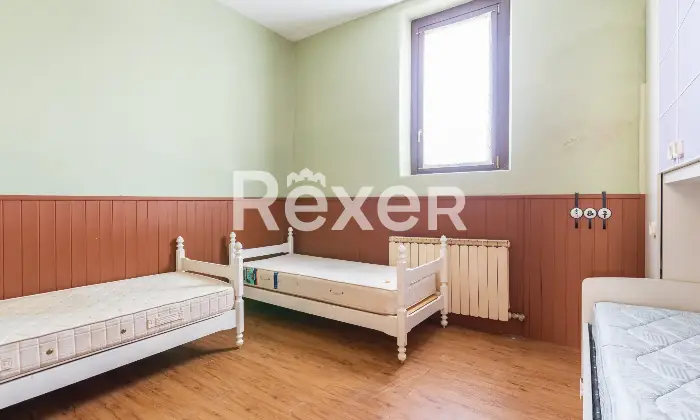 Rexer-Bollate-Bilocale-con-cucina-in-casa-di-corte-Camera-da-letto