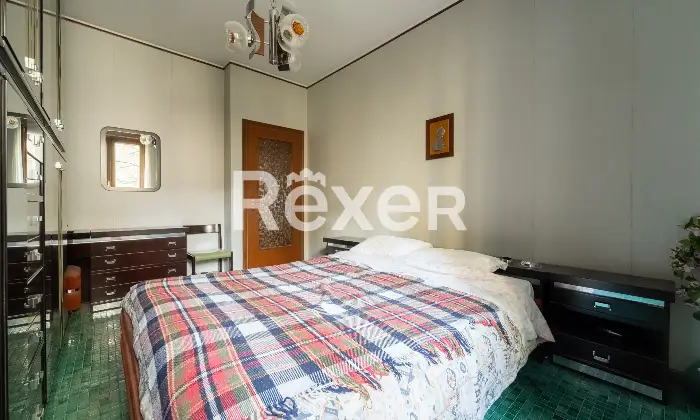 Rexer-Milano-Trilocale-con-doppi-balconi-e-cantina-Camera-da-letto-matrimoniale