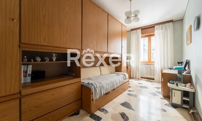 Rexer-Milano-Trilocale-con-doppi-balconi-e-cantina-Camera-da-letto