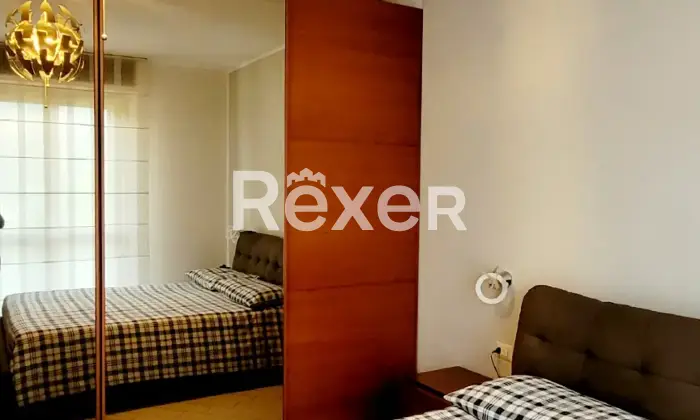 Rexer-Como-Appartamento-indipendente-Sagnino-CameraDaLetto