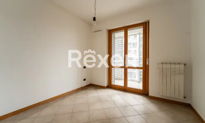 Rexer-Milano-Bilocale-in-torre-Fra-Pampuri-Camera-da-letto-matrimoniale