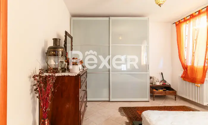 Rexer-Roncalceci-Trilocale-con-giardino-esclusivo-e-posto-auto-coperto-Altro