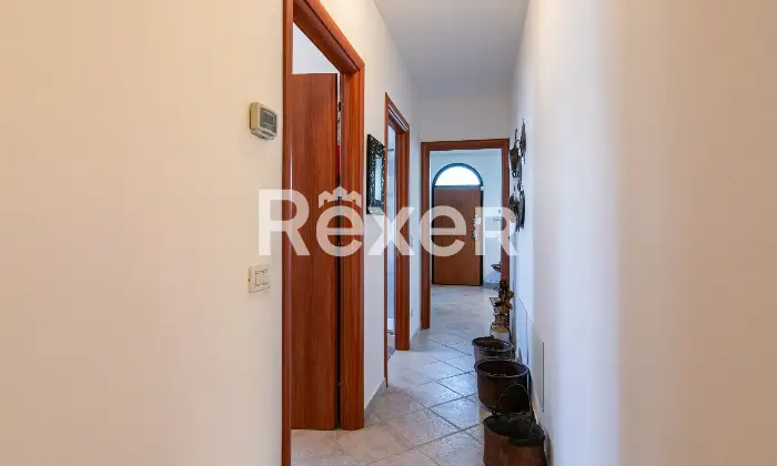 Rexer-Roncalceci-Trilocale-con-giardino-esclusivo-e-posto-auto-coperto-Altro