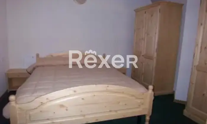 Rexer-Mezzana-appartamento-a-due-passi-dalle-piste-da-sci-CameraDaLetto