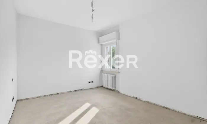 Rexer-Brescia-Ampio-trilocale-piano-alto-con-terrazzina-e-due-box-auto-singoli-Altro