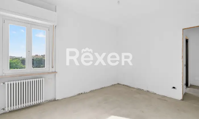 Rexer-Brescia-Ampio-trilocale-piano-alto-con-terrazzina-e-due-box-auto-singoli-Altro