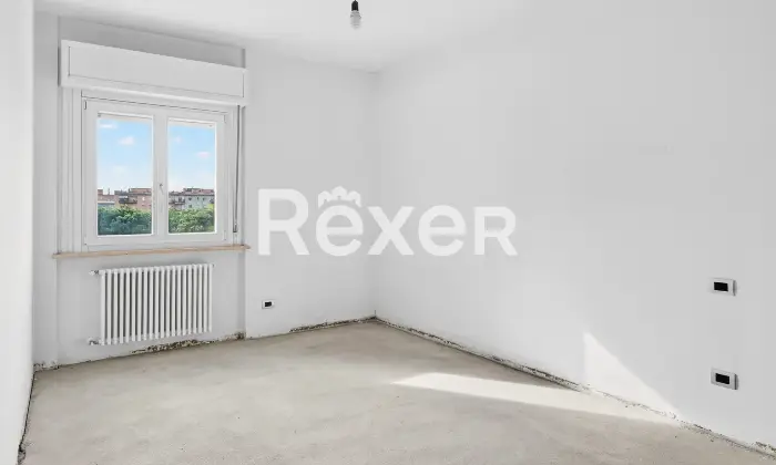 Rexer-Brescia-Ampio-trilocale-piano-alto-con-terrazzina-e-due-box-auto-singoli-Altro