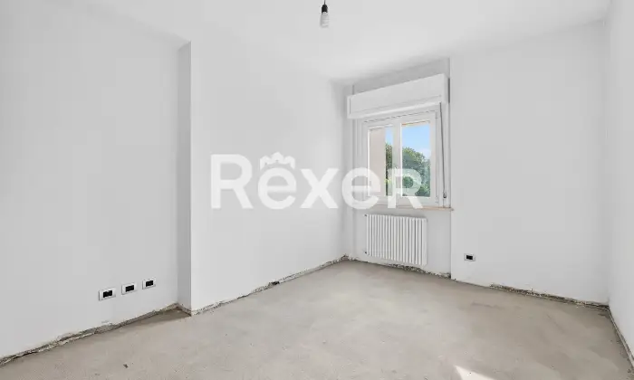 Rexer-Brescia-Ampio-trilocale-piano-alto-con-terrazzina-e-due-box-auto-singoli-Altro