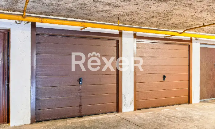 Rexer-Brescia-Ampio-trilocale-piano-alto-con-terrazzina-e-due-box-auto-singoli-Altro