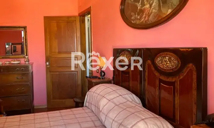 Rexer-Cerisano-Dimora-storica-di-prestigio-nel-cuore-di-Cerisano-CameraDaLetto