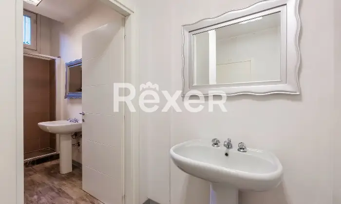 Rexer-Brescia-Ampio-Trilocale-con-posto-auto-coperto-Altro