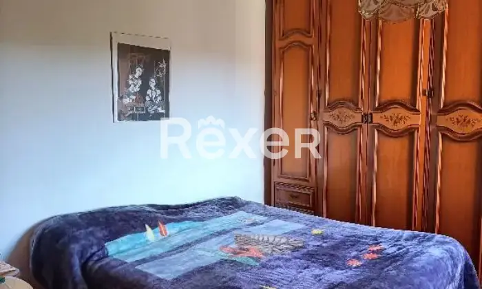 Rexer-Cerveteri-Spazioso-appartamento-su-due-piani-con-giardino-balcone-camino-CameraDaLetto