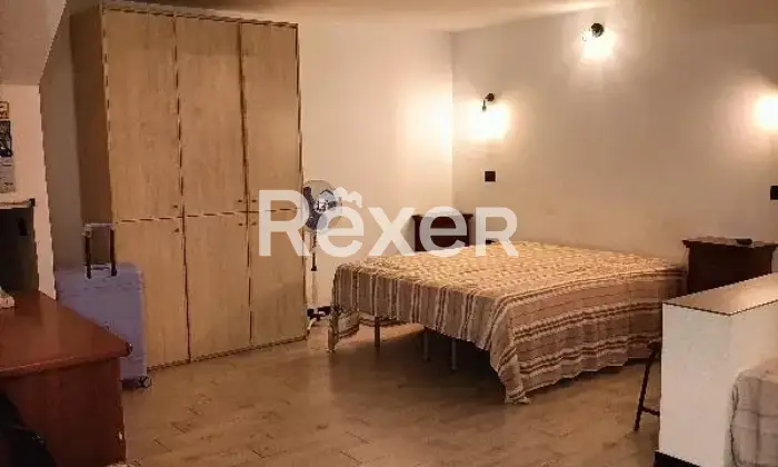 Rexer-Cerveteri-Spazioso-appartamento-su-due-piani-con-giardino-balcone-camino-CameraDaLetto