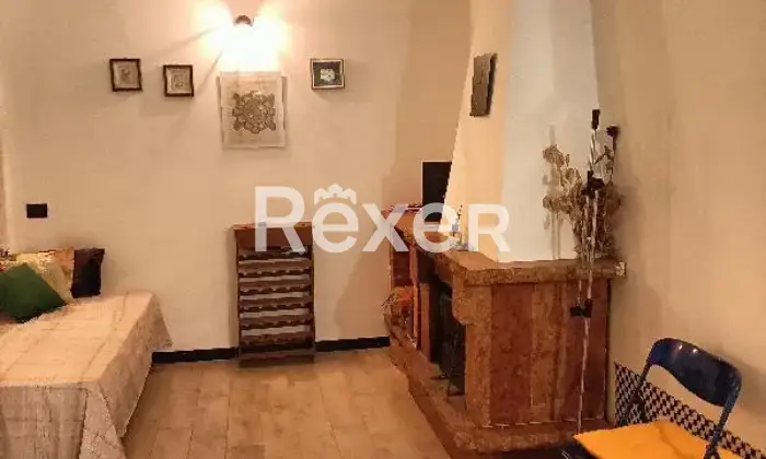 Rexer-Cerveteri-Spazioso-appartamento-su-due-piani-con-giardino-balcone-camino-Taverna