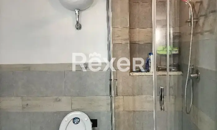 Rexer-Cerveteri-Spazioso-appartamento-su-due-piani-con-giardino-balcone-camino-Bagno