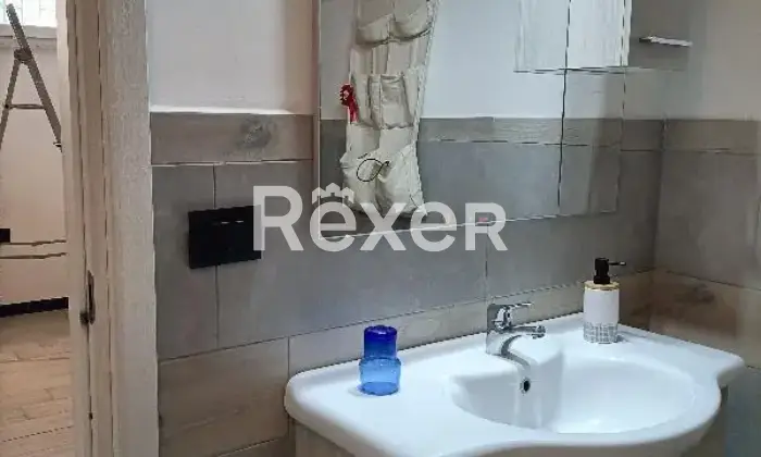 Rexer-Cerveteri-Spazioso-appartamento-su-due-piani-con-giardino-balcone-camino-Bagno