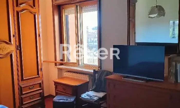 Rexer-Cerveteri-Spazioso-appartamento-su-due-piani-con-giardino-balcone-camino-Camera-da-letto