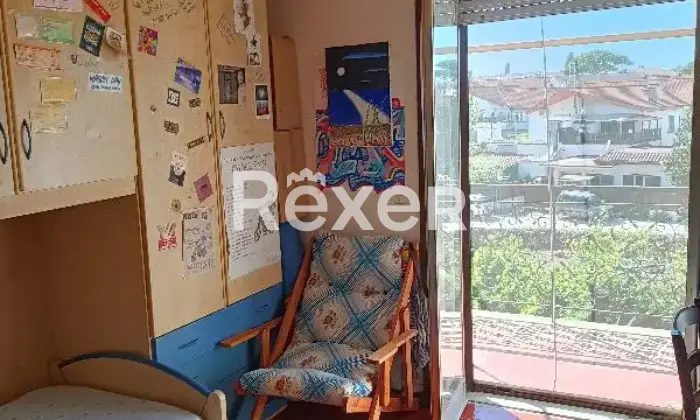 Rexer-Cerveteri-Spazioso-appartamento-su-due-piani-con-giardino-balcone-camino-CameraDaLetto