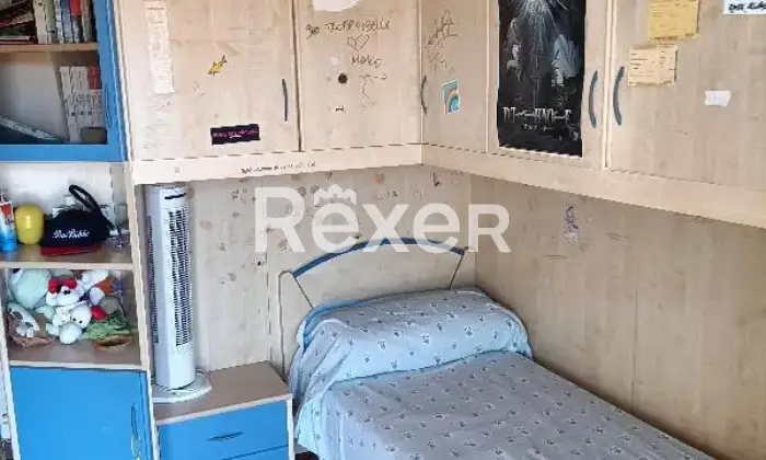 Rexer-Cerveteri-Spazioso-appartamento-su-due-piani-con-giardino-balcone-camino-CameraDaLetto