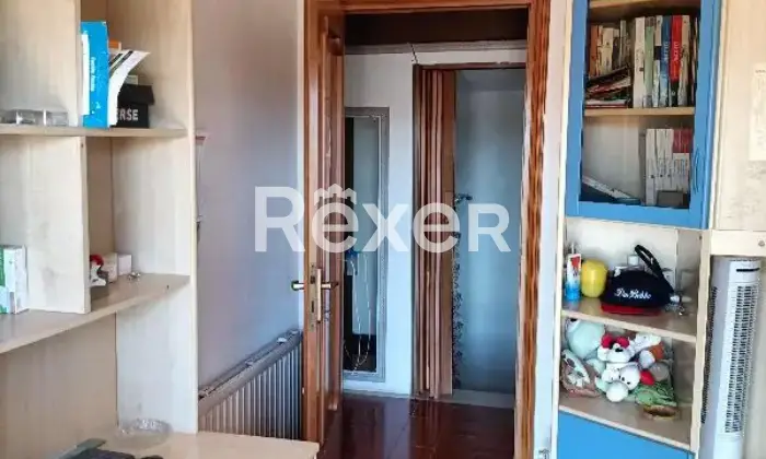 Rexer-Cerveteri-Spazioso-appartamento-su-due-piani-con-giardino-balcone-camino-Cucina