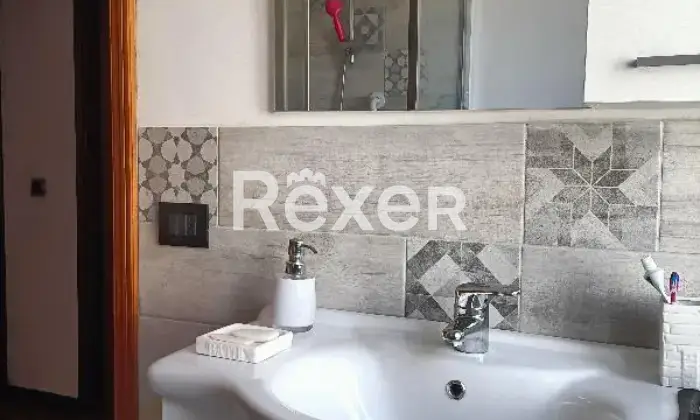 Rexer-Cerveteri-Spazioso-appartamento-su-due-piani-con-giardino-balcone-camino-Bagno