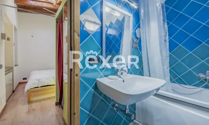 Rexer-Roma-Trilocale-con-patio-coperto-Altro