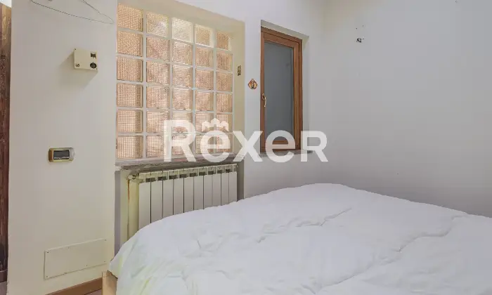 Rexer-Roma-Trilocale-con-patio-coperto-Altro