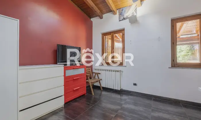 Rexer-Roma-Trilocale-con-patio-coperto-Altro