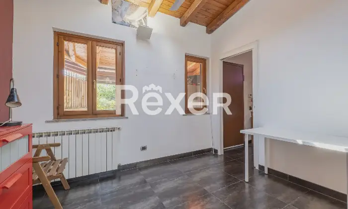 Rexer-Roma-Trilocale-con-patio-coperto-Altro