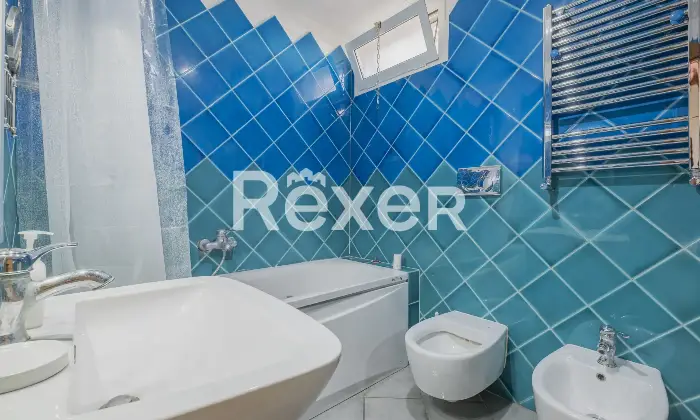 Rexer-Roma-Trilocale-con-patio-coperto-Altro