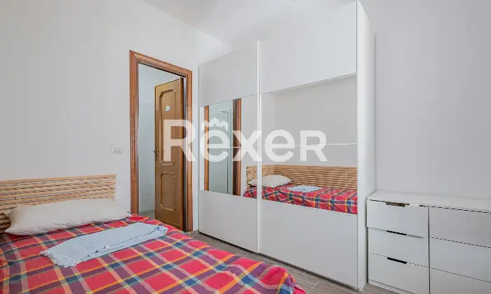 Rexer-Roma-Attico-ampia-metratura-con-posto-auto-Altro