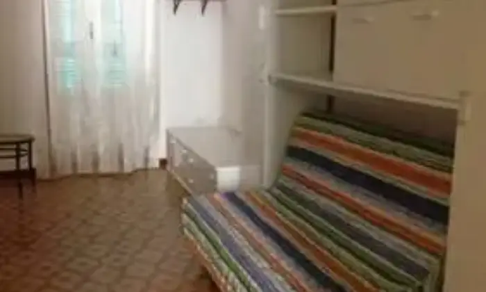 Rexer-Capodimonte-Appartamento-vacanze-a-Capodimonte-CAMERA-DA-LETTO