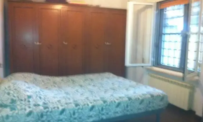 Rexer-Fiumicino-Dependance-a-Fiumicino-brevi-periodi-CAMERA-DA-LETTO