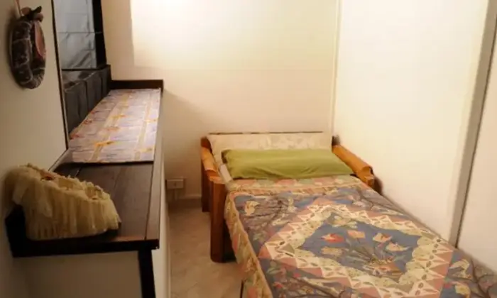 Rexer-Fiumicino-Dependance-a-Fiumicino-brevi-periodi-CAMERA-DA-LETTO