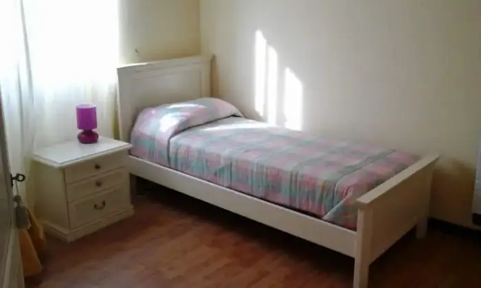 Rexer-Fiumicino-Appartamento-vacanze-a-Fregene-CAMERA-DA-LETTO