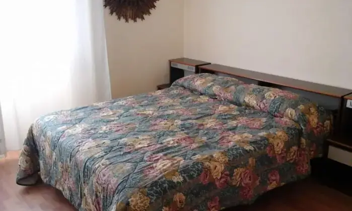 Rexer-Fiumicino-Appartamento-vacanze-a-Fregene-CAMERA-DA-LETTO