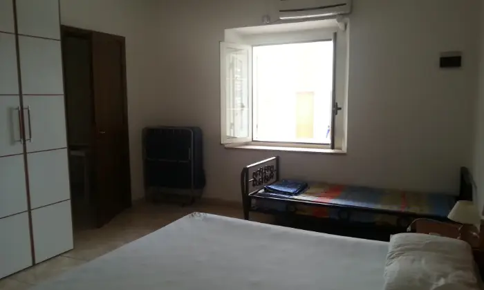 Rexer-Portoscuso-Appartamento-vacanze-a-Portoscuso-CAMERA-DA-LETTO