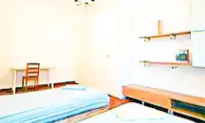 Rexer-Milano-Posto-letto-per-brevissimi-periodi-CAMERA-DA-LETTO