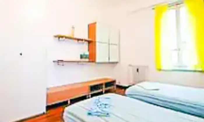 Rexer-Milano-Posto-letto-per-brevissimi-periodi-CAMERA-DA-LETTO